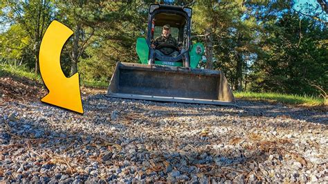 how to level a gravel driveway with a skid steer|How.